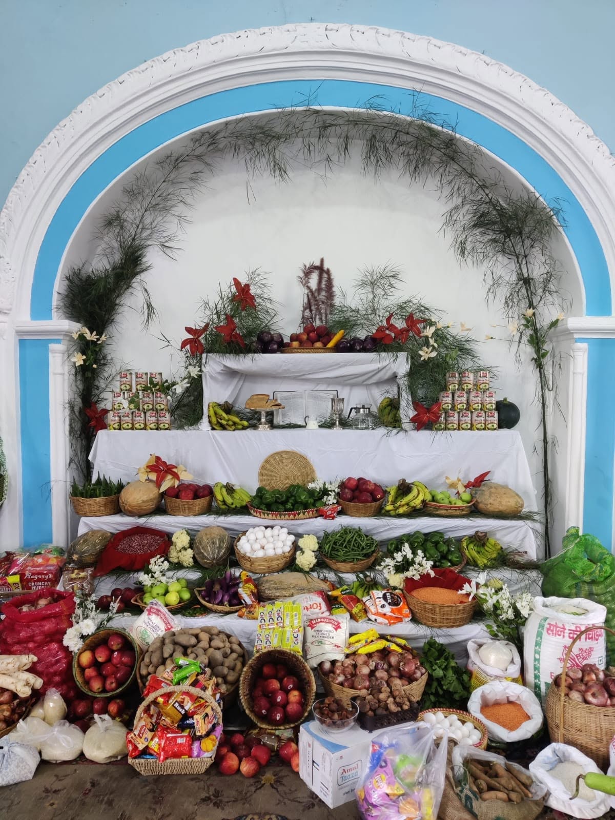 Altar decorated with produce and offerings for the harvest festival at Union Church