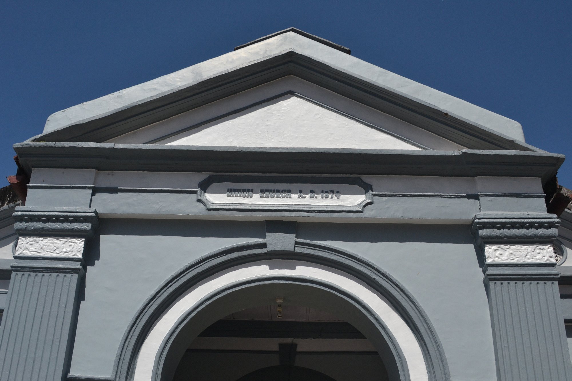 Cornerstone above the entrance reading Union Church A.D. 1874